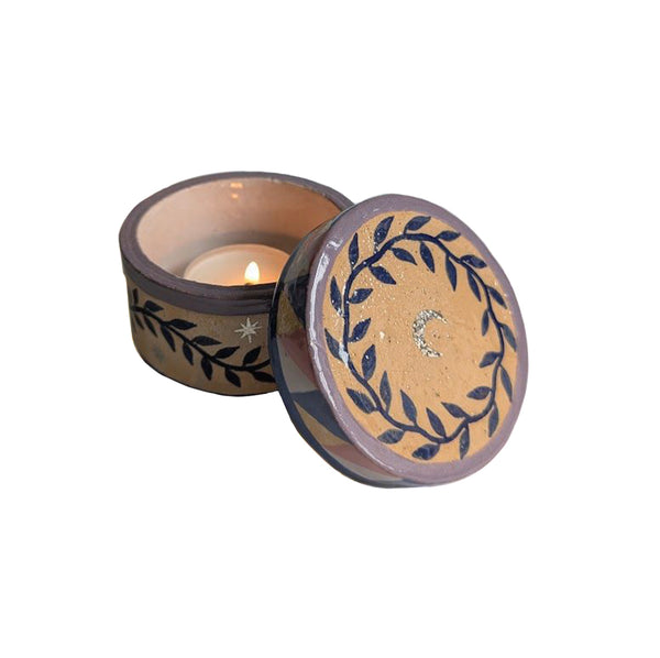 Moon Candle Holder with Lid in hand-painted ceramic jar showcasing celestial motifs.