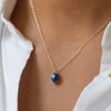 products/1351-05_Celine-Daoust_From-The-Earth-Lapis-Beetle-and-Diamonds-Chain-Necklace_1_model-copie-1-868x1305-c-default.jpg