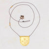 products/small-medallion-talisman-necklace-river-song-llc-123365_1800x1800_84d27048-d516-4a9d-bf04-506cc9a43d2a.jpg
